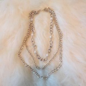 Silver chain and pearl necklace.